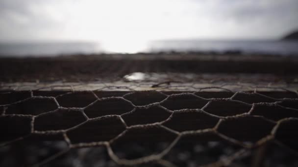 Metallic Wire Mesh Close Blurred Ocean Seascape Background — Video Stock