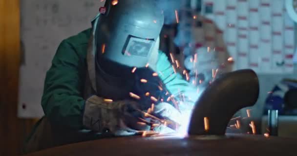 Blue Collar Industrial Welder Worker Actively Welding Sparks Job Factory — Vídeo de Stock