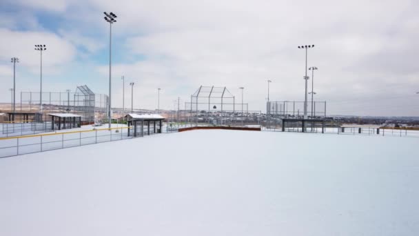 Baseball Softball Field Covered Fresh Powder Snow Day Aerial Orbit — Stock videók