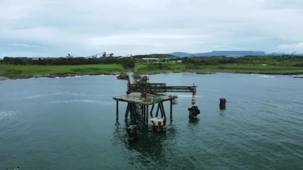 Industrial Structure Protruding Out Ocean Abandon Coal Mine Foreground Revealing — Vídeo de Stock