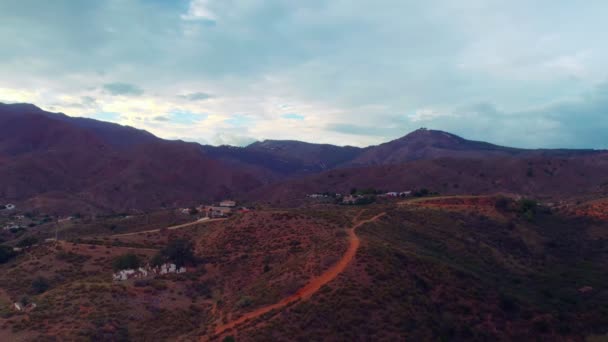 Drone Flying Backwards Cloudy Day Mountains — Stockvideo