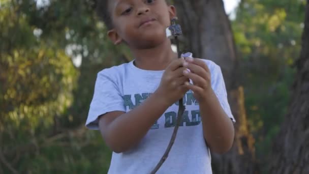 Young Mixed Raced Boy East Marshmellow Has Been Roasted Fire — Vídeo de Stock