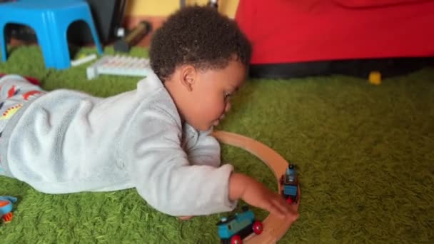 Two Year Old Exotic Cute Afroeuropean Child Playing His Toy — Vídeo de stock