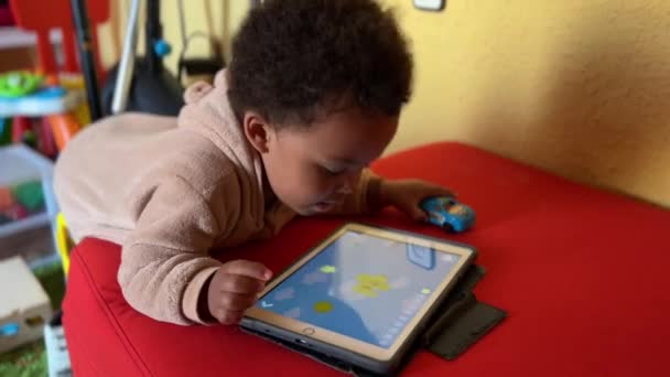 Two Year Old Afroeuropean Child Playing Tablet Home — Stok video