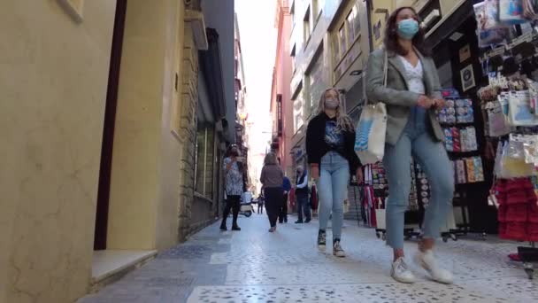 People Wearing Face Masks Narrow Street Malaga Souvenir Shop Narrow — Video Stock
