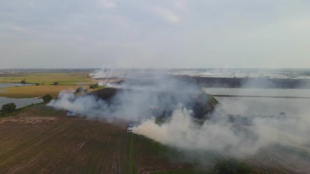 Aerial Footage Sliding Left Newly Tilled Land Smokes Bellowing Air — 비디오