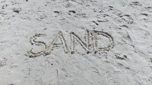 Sand Written Beach Capitals Finger White Sand Circular Pan — Video Stock