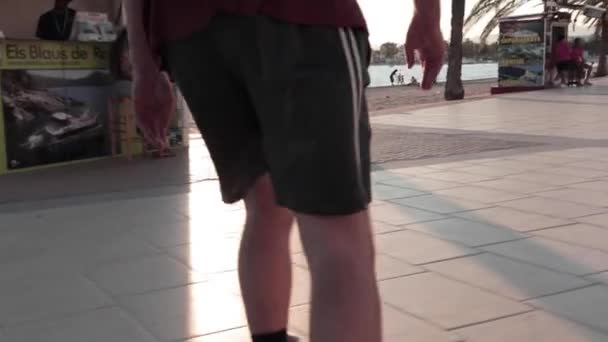 Slow Motion Person Legs Roller Blading Pavement Golden Hour Face — Stockvideo