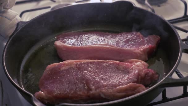 Steaks Being Cooked Cast Iron Skillet Oil Slow Motion — ストック動画