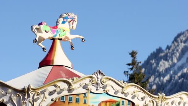 Top Horse Carousel Turning Snowed White Mountains Bottom — Stok Video