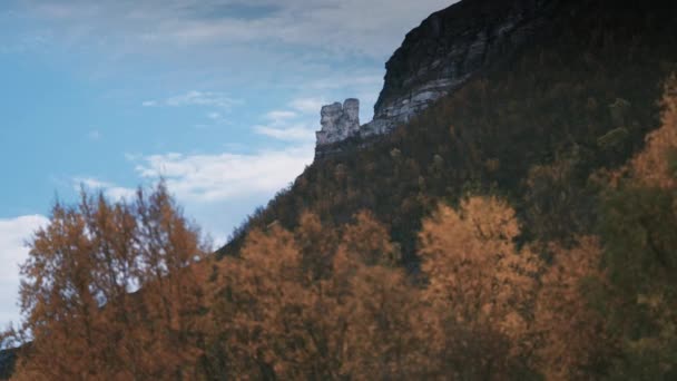 Grey Mountain Towering Autumn Forest Slow Motion Pan Left — Stock video