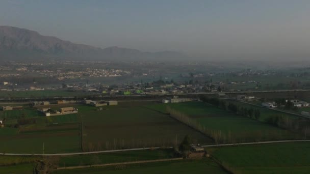 Aerial Drone Flying Rural Abbottabad Farm Fields Circle Dolly View — 비디오