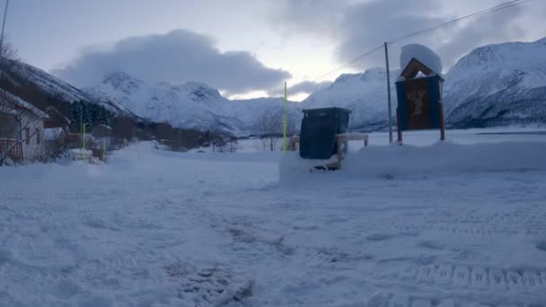 Silly Fun Throwing Residential Garbage Bin Deep Snow Mountains Northern — Vídeo de stock