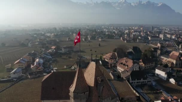 Aerial Swiss Flag Flying Top Castle Tower Drone Pulling Back — Stockvideo