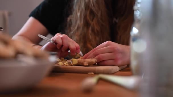Stationary Shot Woman Hands While Peeling Ginger Spoon She Making — Stock Video