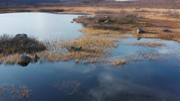Aerial View Lake Marshland Clouds Reflected Mirrorlike Surface Slow Motion — Vídeo de Stock
