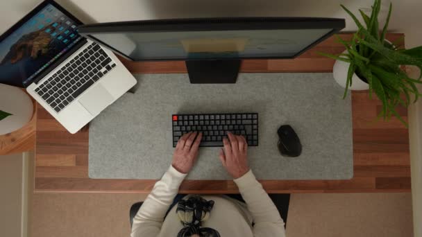 Older Lady Using Computer Keyboard Top Shot Wide — стоковое видео
