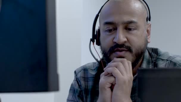 Bald Bearded Asian Male Wearing Headset Conversation Customer Hands Resting — 비디오