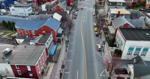 Red Car Drives Small Town America Usa Aerial Reverse Dolly — Vídeo de Stock