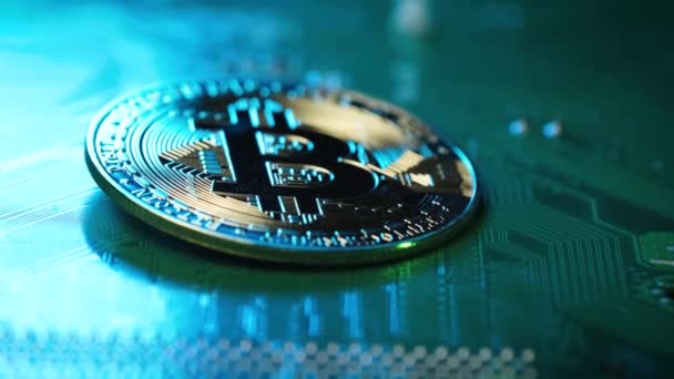 Dolly motion towards Golden Bitcoin on integrated circuit board, Mining bitcoin Concept