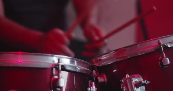 Double Drums Being Played Red Light — Stockvideo