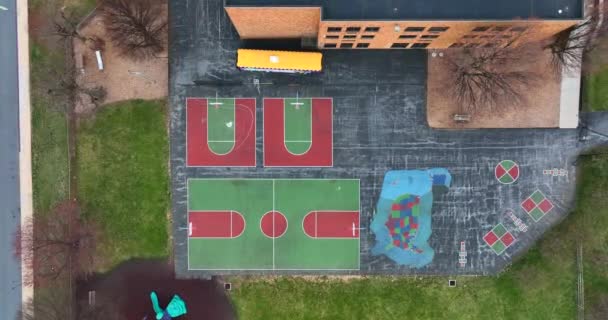 Top Aerial School Playground School Bus Basketball Court Four Square — Stock Video