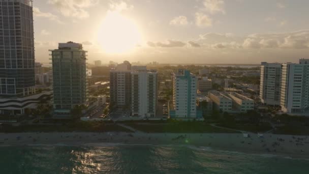 Cinematic Miami Beach Cityscape Sunset Aerial Trucking Left — Stock Video