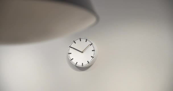 Office White Clock Hanging White Wall Ticking Showing — Stock video