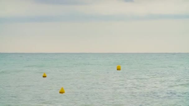 View Sea Turquoise Waters Yellow Balls Floating Water — Stock Video