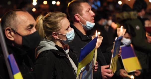 United People Praying Peace Ukraine Candles Ukrainian Flags Night Amidst — Wideo stockowe