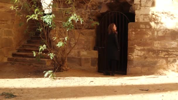 Young Redhead Girl Admiring Old Gate Ruins Monastery Spain Xii — Wideo stockowe