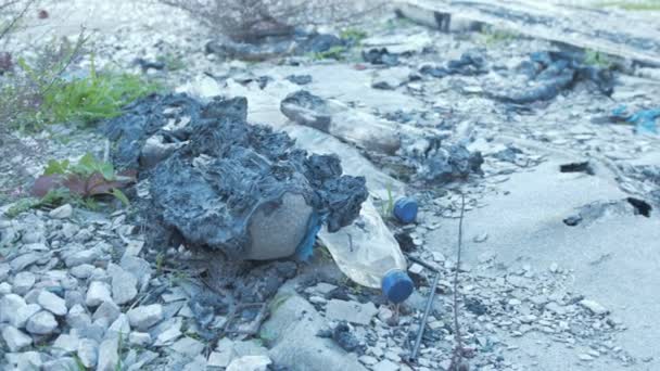 Man Picks Burnt Melted Unhcr Blanket Remnants Moria Refugee Camp — стокове відео