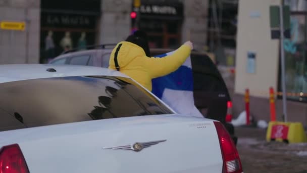 Person Waving Flag Out Car Windows Celebrating Olympic Ice Hockey — стокове відео