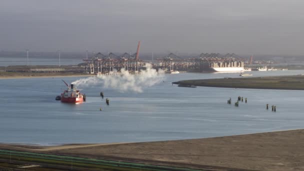 Anchored Ship Funnel Smoke Polluting Dutch Industrial Mississippi Port Aerial — стокове відео