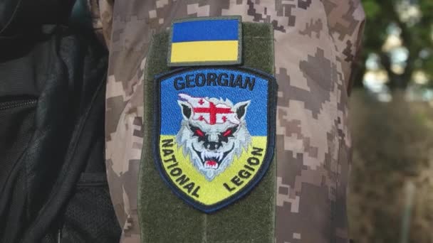 Close Shot Georgian National Legion Patch Ukrainian Flag Soldiers Arm — стокове відео