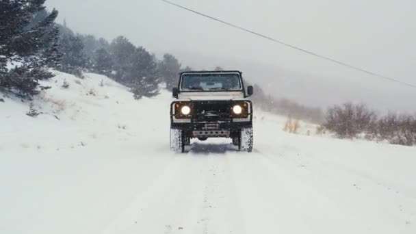 Land Rover Defender D90 Backcountry Roading Snowy Road Blizzard Snowfall — Stok video