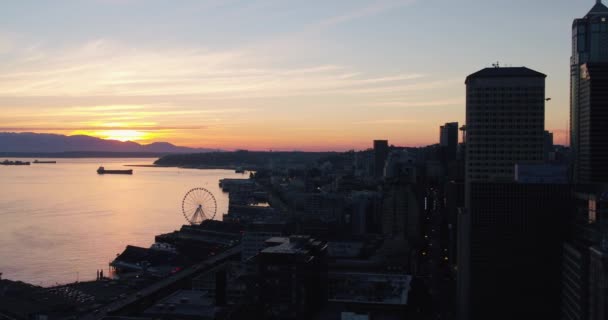 Wide Aerial Shot Revealing Seattle Waterfront Warm Sunset Distance — ストック動画