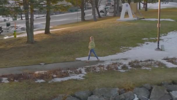 Young Women Enjoying Late Winter Evening Snow Aerial Looking Camera — Stock Video