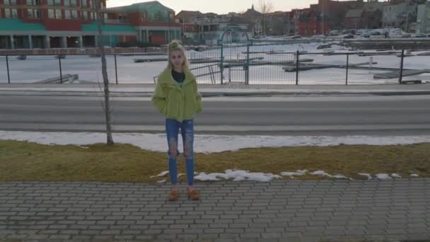 Young Women Enjoying Late Winter Evening Snow Aerial Looking Camera — Vídeo de Stock