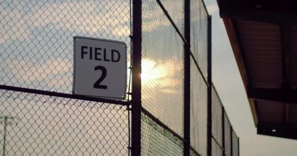 Establishing Shot Ball Field Sunrise Sun Shines Wire Fence Great — Vídeos de Stock