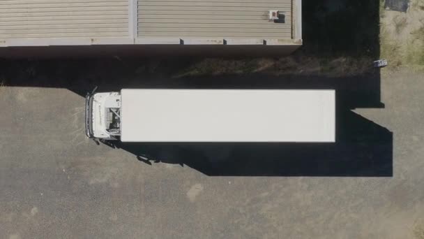 Smooth Aerial Ascent Truck Leave Depot — Vídeo de stock