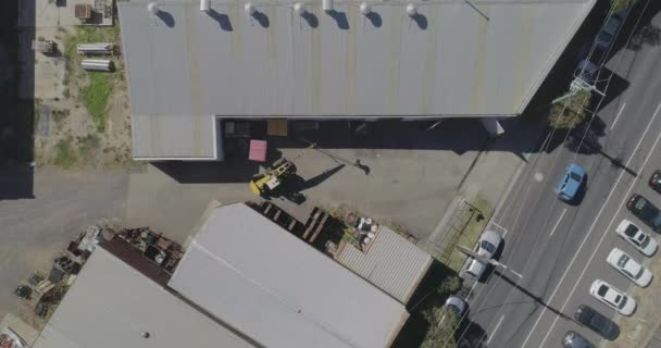 Factory Worker Assisting Mobile Crane While Moving Heavy Beam Too — Stock video