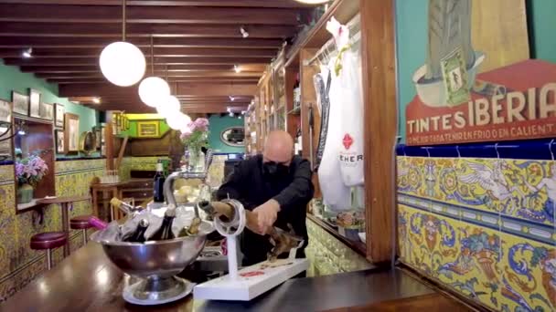Man Cuts Serrano Ham Bar Counter Colorful Bar Malaga Vine — Stock Video