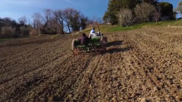People Crawler Tractor Seeder Sowing Field Sunset Aerial Approaching Shot — Stock Video