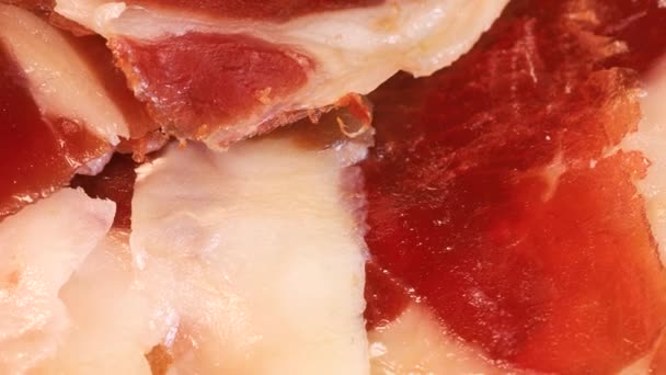 Slices Intense Spanish Serrano Ham Bread Rotating Wooden Board Close — Vídeo de Stock