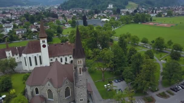 Catholic- and Reformed churches right next to each other, Interlaken; aerial