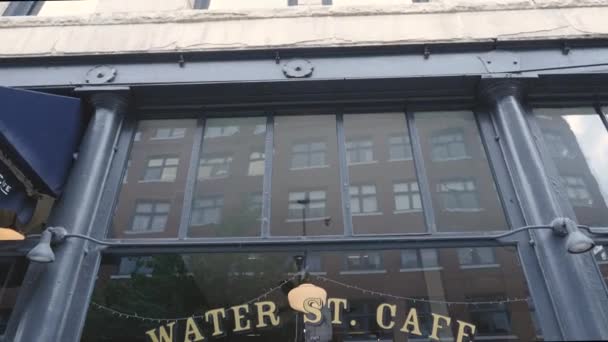 Water Cafe Front Entrance Window Wide Angle Panning Sign Sunny — Stockvideo