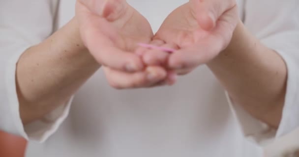 Pretty Pink Heart Being Offered Viewer Close Hands — Vídeo de Stock