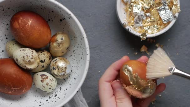 Close Shot Female Hand Removing Golden Foil Orange Colored Painted — Wideo stockowe