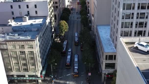 Overhead Aerial Shot Bus Driving Seattle Downtown Streets — Vídeos de Stock